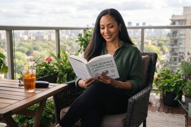 woman reading the science behind healthy aging
